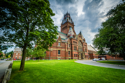Red-brick, Gothic-style building with a prominent tower.
