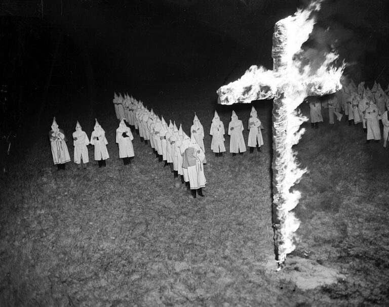 Hooded KKK FIGURE STALKS Streets As Cameras ROLL
