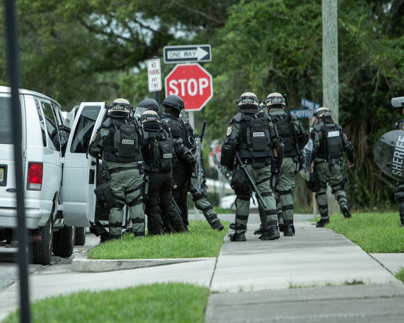 Featured image related to Driver crashes into police escort carrying SWAT vehicle